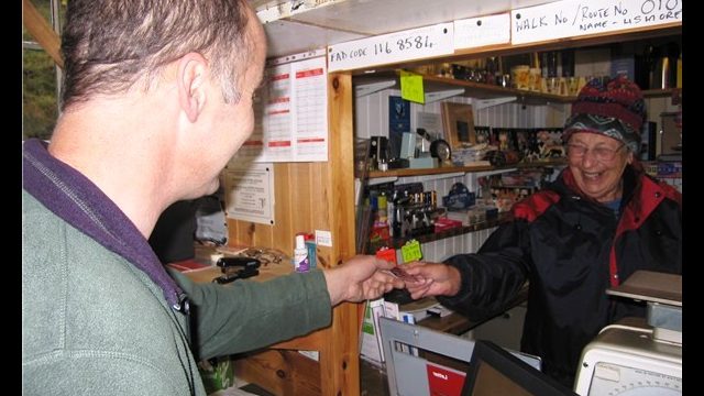 David serving Marjory MacDonald